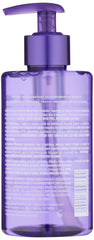 Close-up of Seaberry shampoo foam on hand for hydration.