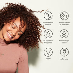 Odele Hair Oil bottle with label emphasizing clean ingredients.