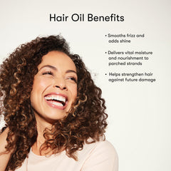 Drops of Odele Hair Oil on ends signaling nourishment for damaged hair.