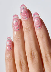 Ohora N Candy Swirl nails worn with wraps for salon-style result.