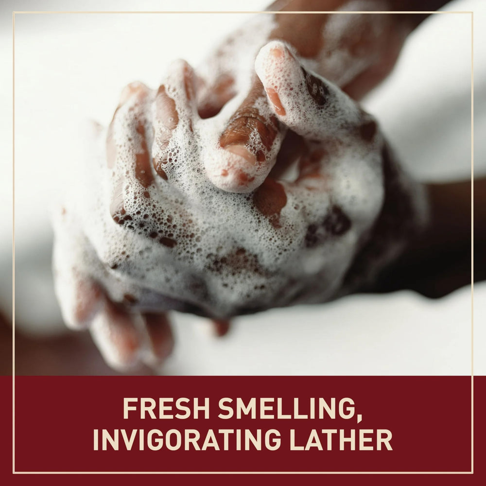 Foamy lather from Old Spice Palm Tree soap to cleanse skin.