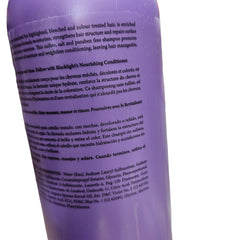 Oligo Professionnel Blacklight shampoo foamy-lather captured during wash.