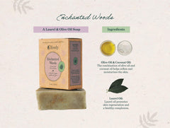 Close-up of Olively Enchanted Woods soap bar highlighting ingredients.