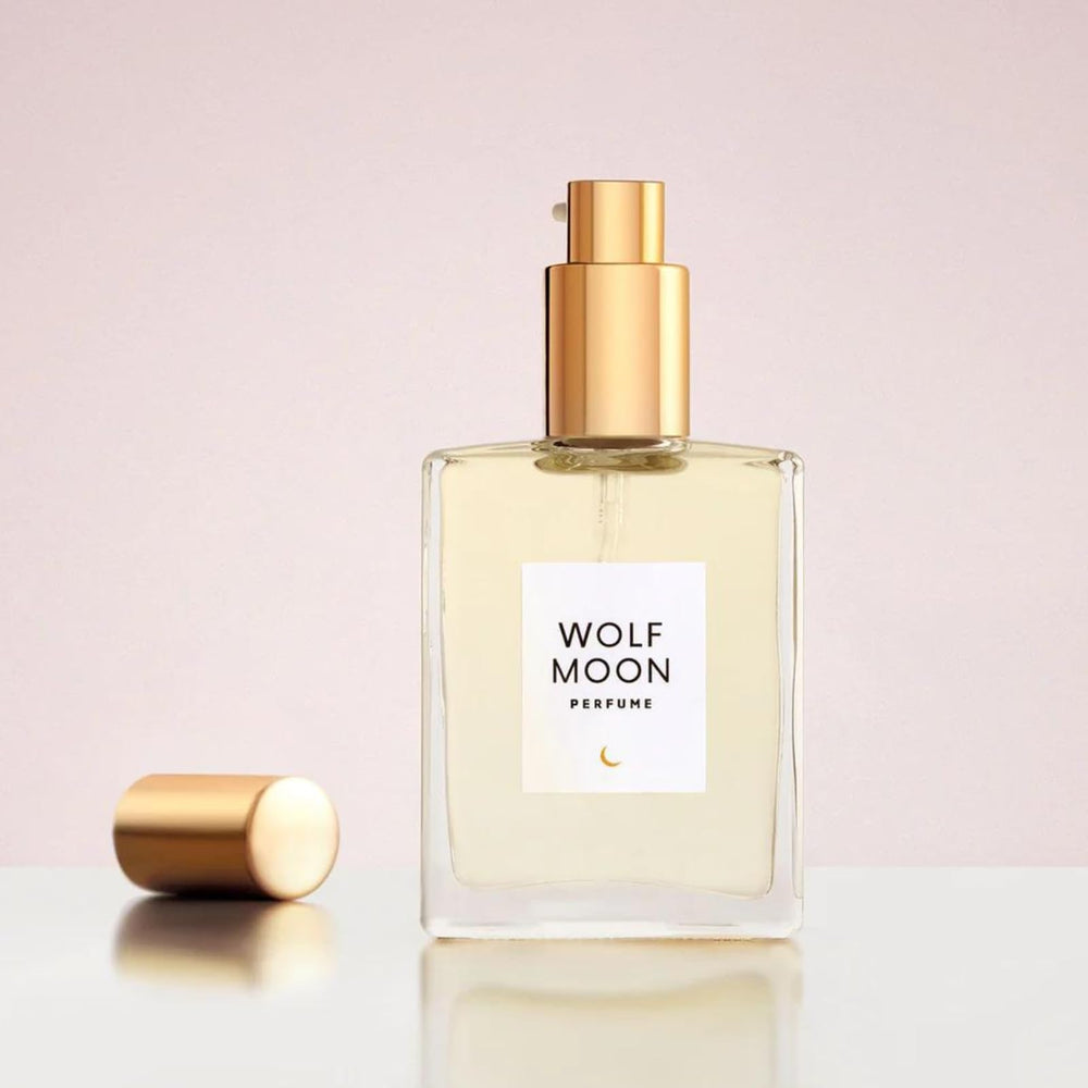 Olivine Atelier Wolf Moon bottle closeup, amber-vanilla scent with nourishing oils