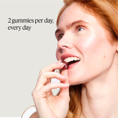 Daily-use scene of OMI WELLBEAUTY gummies with morning routine.