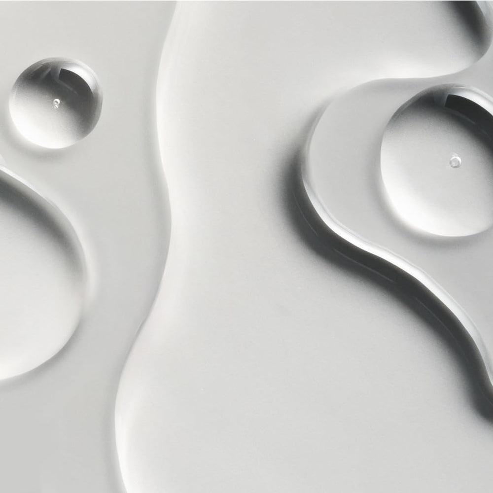oneskin HAIR OS-01 peptide serum drop illustrating precise scalp application
