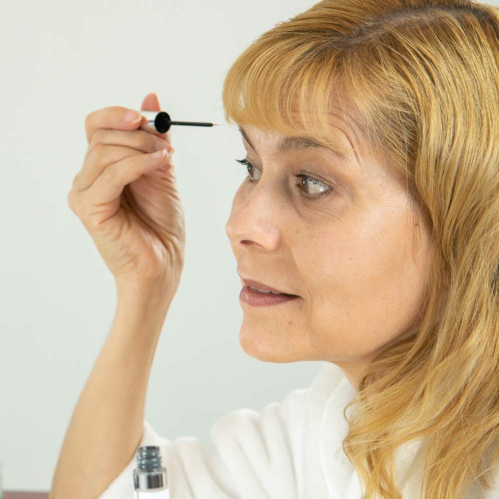 Organys Lash & Brow Serum daily-use illustration showing routine application.