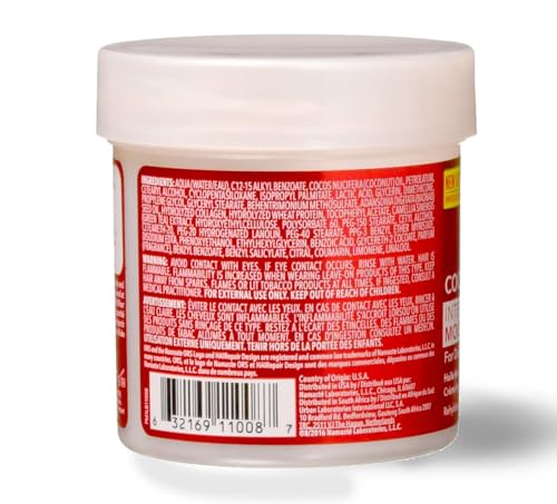 Close-up of ORS HAIRepair creme being applied for instant hydration
