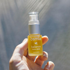Osmia serum on hand shows quick absorption and non-greasy finish.