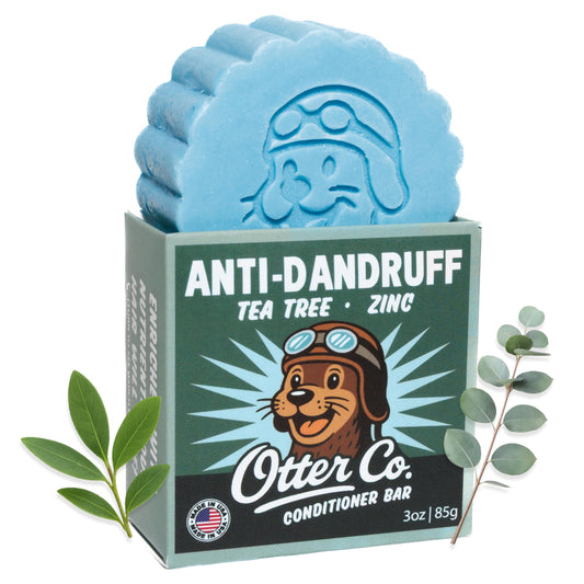 Otter Co anti-dandruff tea tree conditioner bar shown for scalp relief and clean feel.