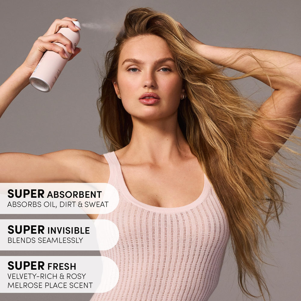 OUAI dry shampoo on hair with oil and dirt absorption for renewed texture.