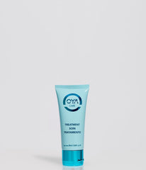 OYA Treatment hair mask being applied for silky, manageable strands.