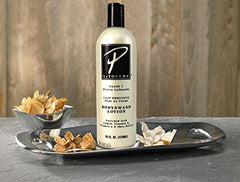 P. Latouche body and hand lotion 16 oz hands application view highlighting moisturizing routine.