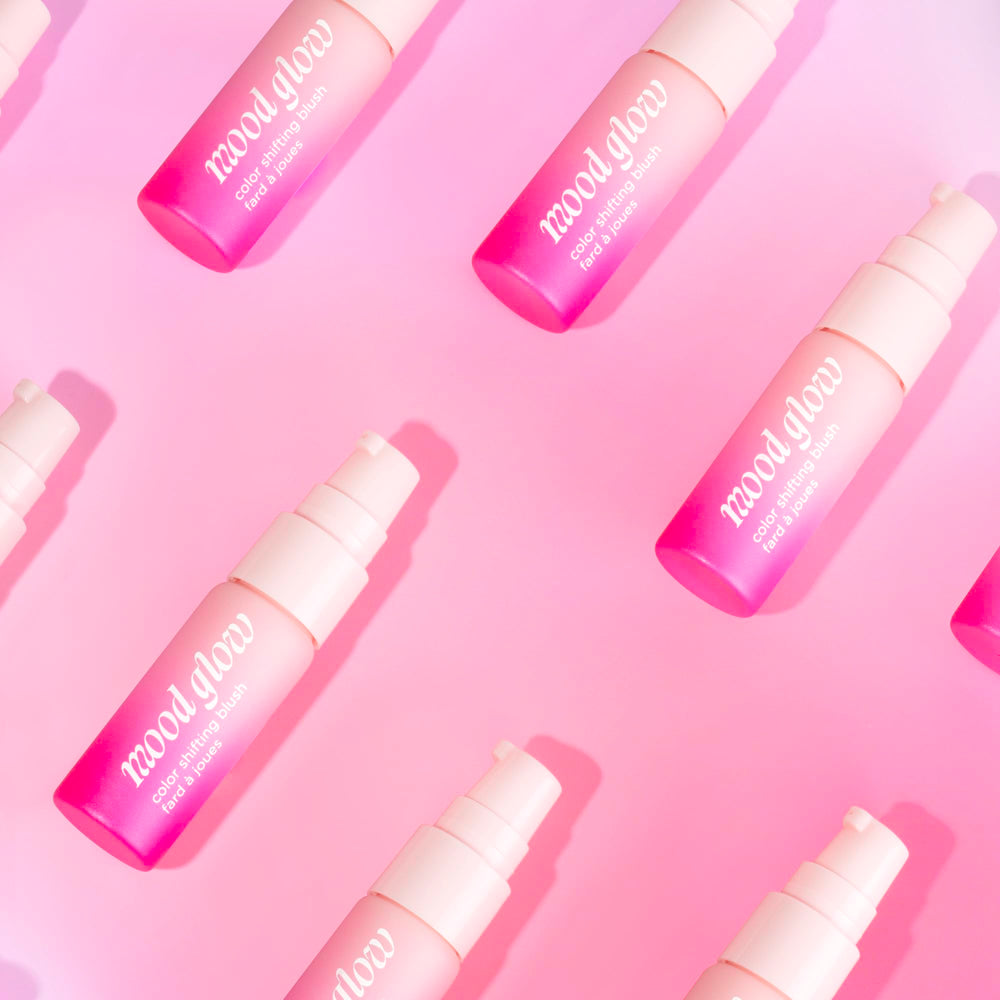 Pacifica Mood Glow application on lips presents coordinated flush with lip safe formula.