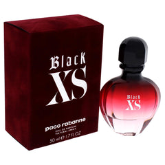 Paco Rabanne Black XS spray shows easy application and all-day scent.
