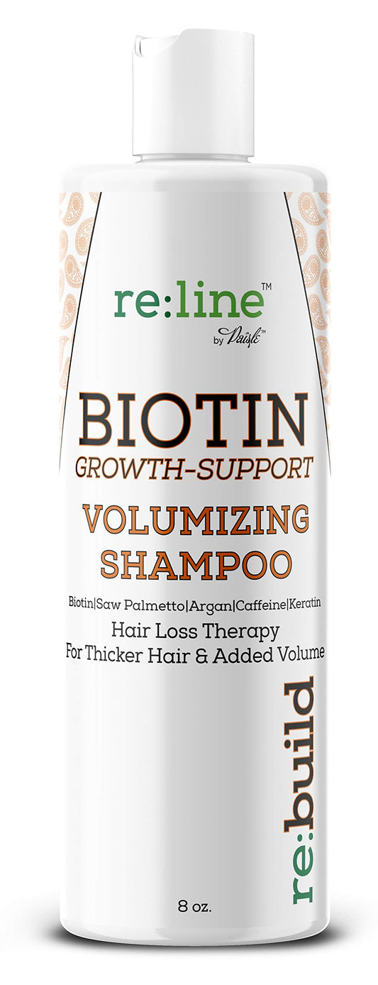 Paisle Botanics volumizing biotin shampoo bottle pouring for fuller-looking hair