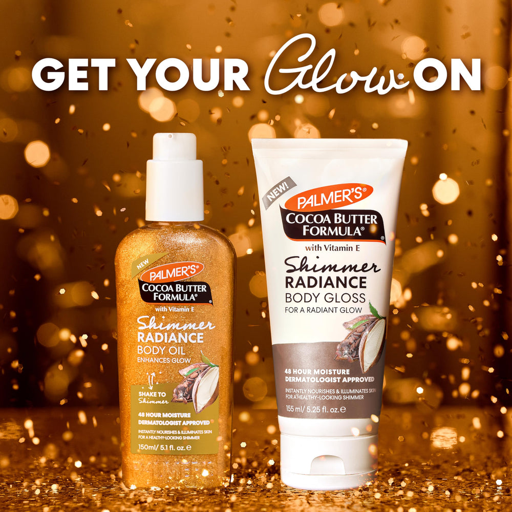 Golden shimmer on arms in sunlight from Palmer's oil.