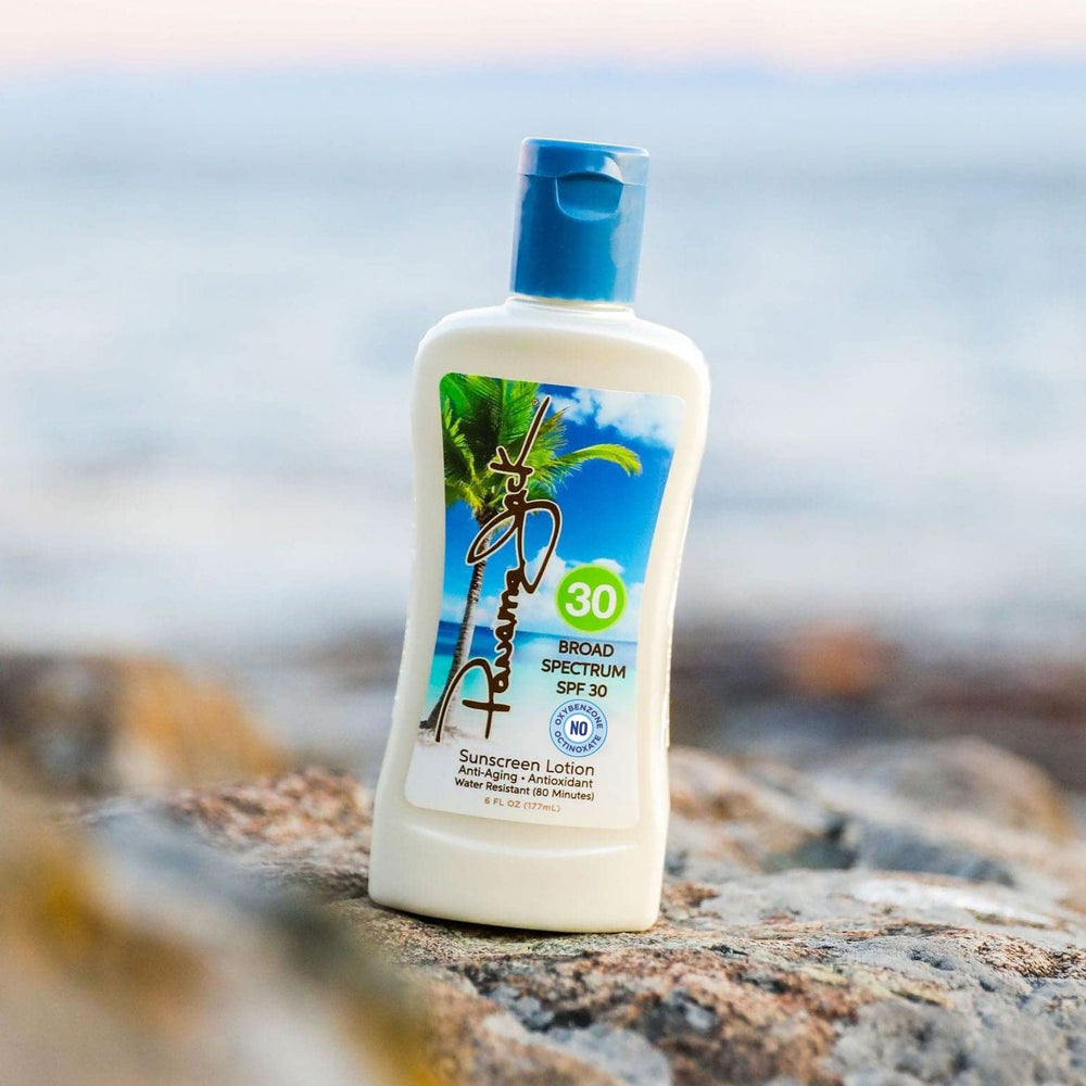 Panama Jack Sunscreen SPF 30 tropical fragrance swirls for vacation vibes.