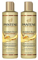 Pantene Gold Series Moisture Boost shampoo bottle pouring, delivering cleansing and hydration