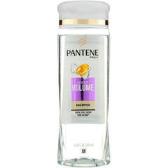 Pantene Pro-V Sheer Volume bottle being poured to show lightweight cleansing.