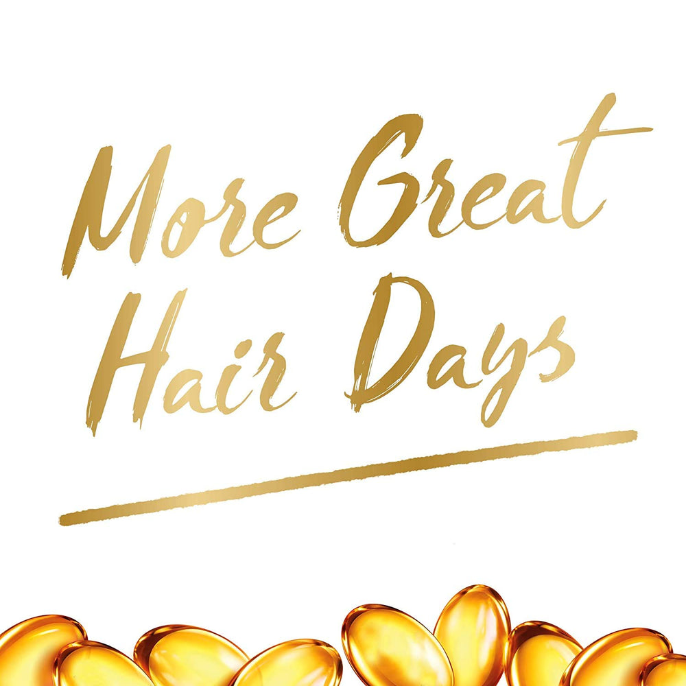 Pantene Pro-V Smooth & Sleek display with silky hair sample.