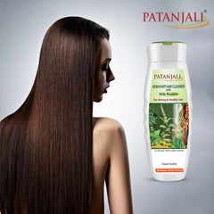 Patanjali Kesh Kanti Milk Protein Shampoo frizz-free strands with natural conditioning.