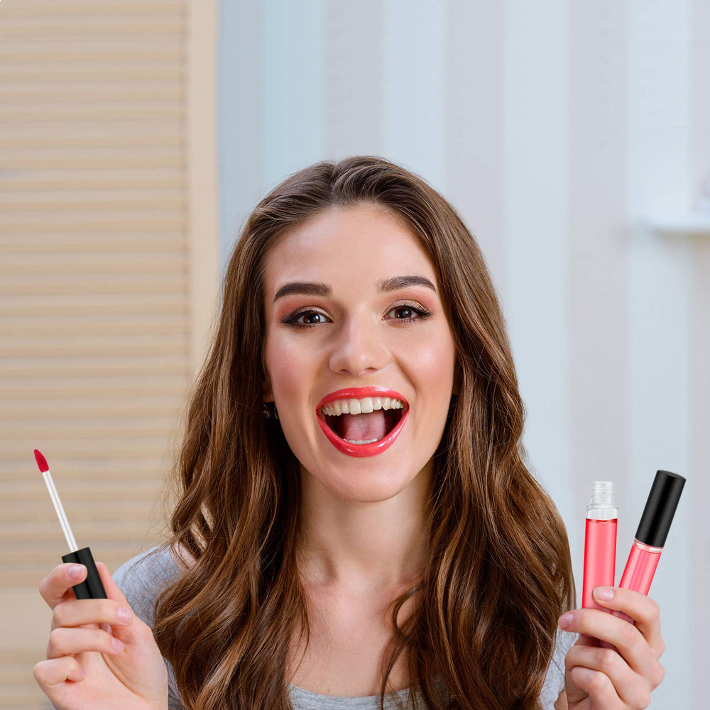 Patelai black-cap lip gloss tubes designed for travel.