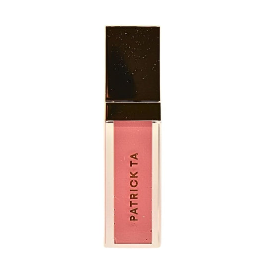 Patrick Ta Major Volume Plumping Lip Gloss Say Less bottle with rich milky pink shine.