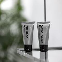PATRICKS CDLD conditioner applied to scalp and hair for thickness.