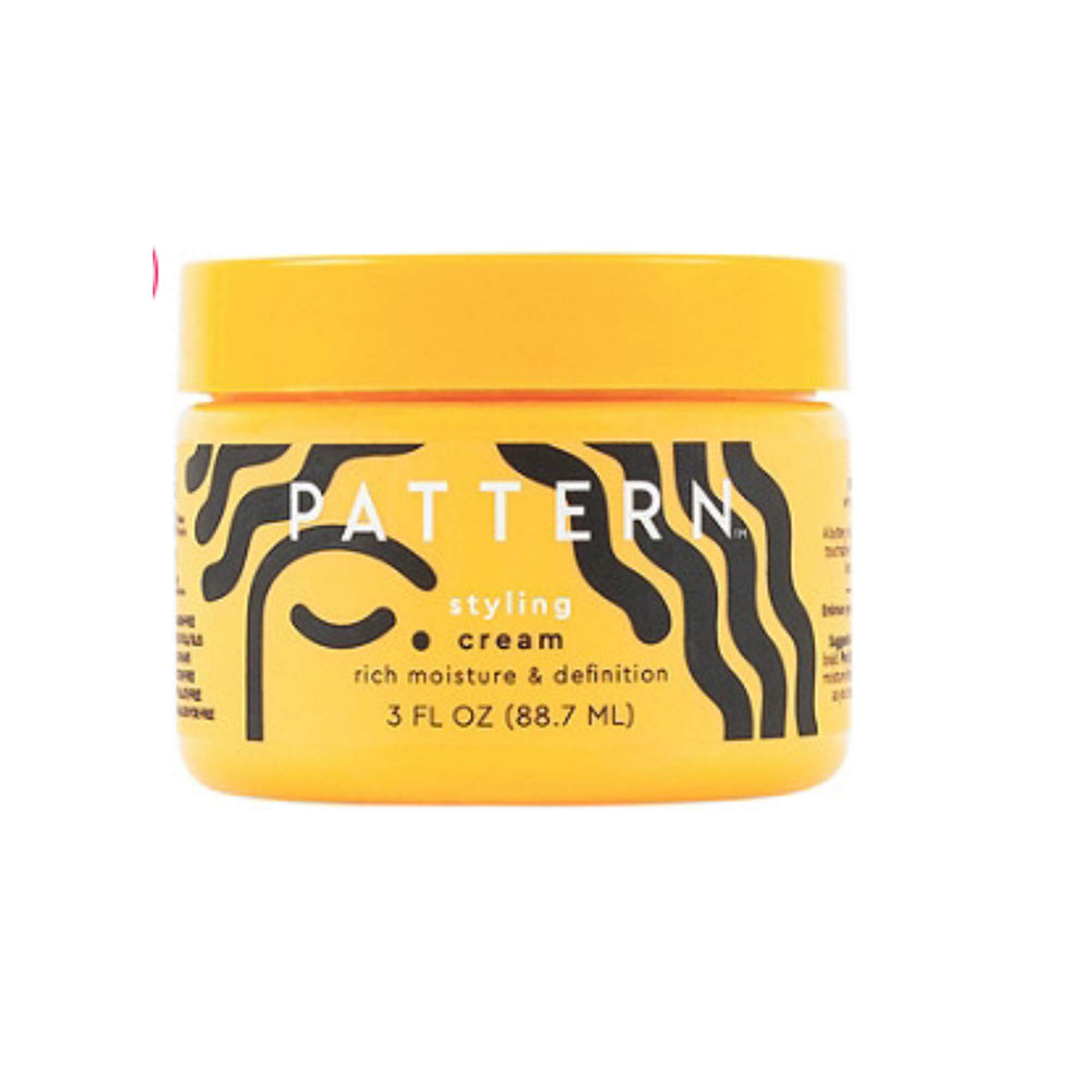 PATTERN Styling Cream application on curls for lasting definition and moisture.