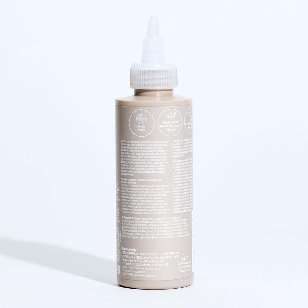 Paul Mitchell Foaming ACV Rinse product close-up shows texture