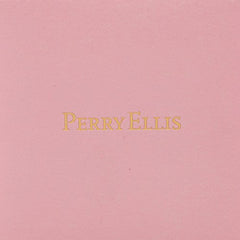 Perry Ellis Love EDP on vanity for daily routine.