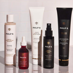 PHILIP B Thermal Protection Spray travel-size bottle for on‑the‑go styling.