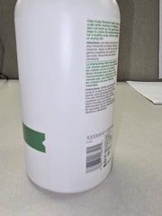 Applying Philip Kingsley shampoo for daily use on scalp.