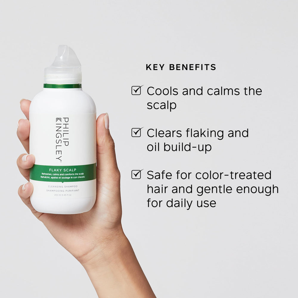 Philip Kingsley Flaky Scalp Shampoo applied to hair for a refreshing cleanse on oily scalp.