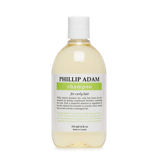 Phillip Adam Curly Shampoo bottle pouring hydration for curls