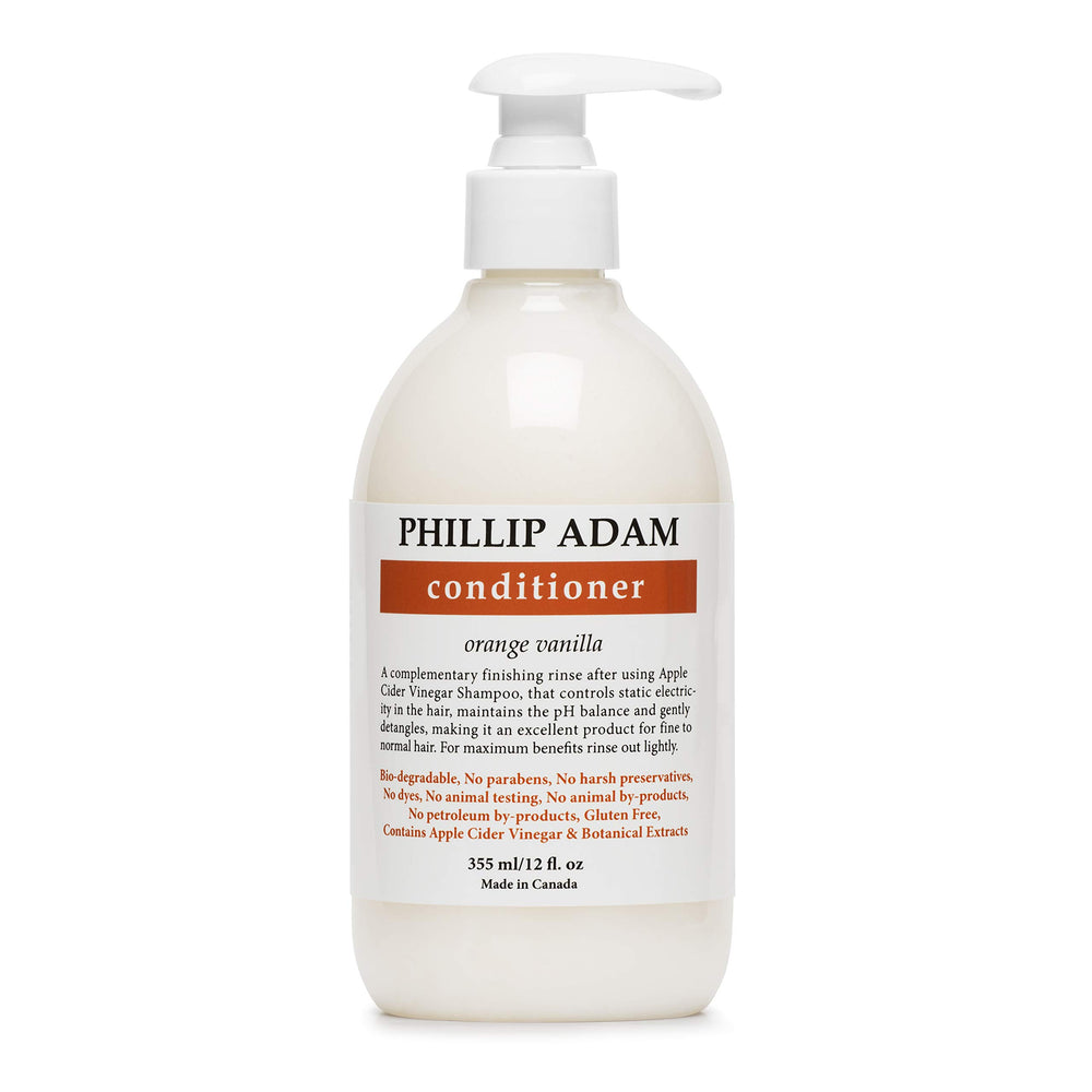 Phillip Adam Orange Vanilla conditioner bottle showcasing natural scent and color-safe formula.