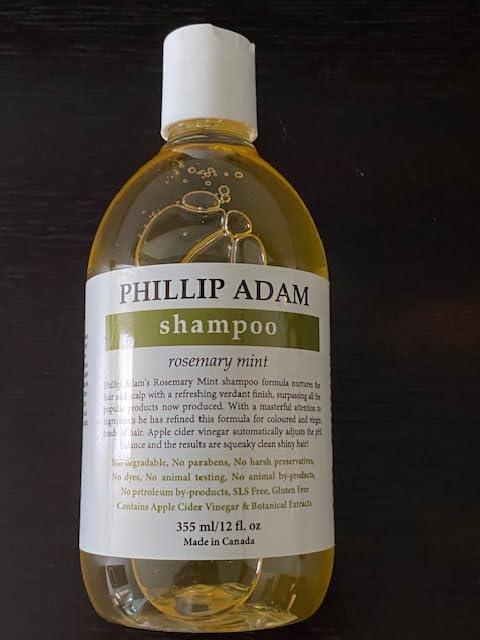 Phillip Adam Rosemary Mint Shampoo ingredients panel highlights natural botanicals for hair care.