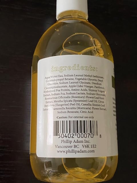 Phillip Adam Rosemary Mint Shampoo scent closeup evokes invigorating spa-like routine.