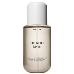 PHLUR Beach Skin Body Mist bottle front highlights sun-kissed florals and versatile scent.