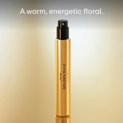 PHLUR Golden Rule travel-size 9.5 mL fits bags and purses for on-the-go fragrance.