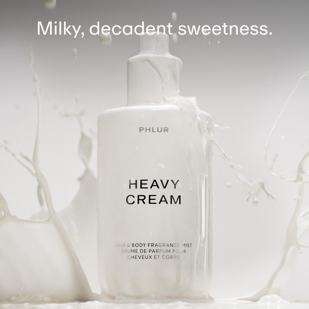 PHLUR Heavy Cream spray mist—gentle, all-over application for lightweight daily fragrance.