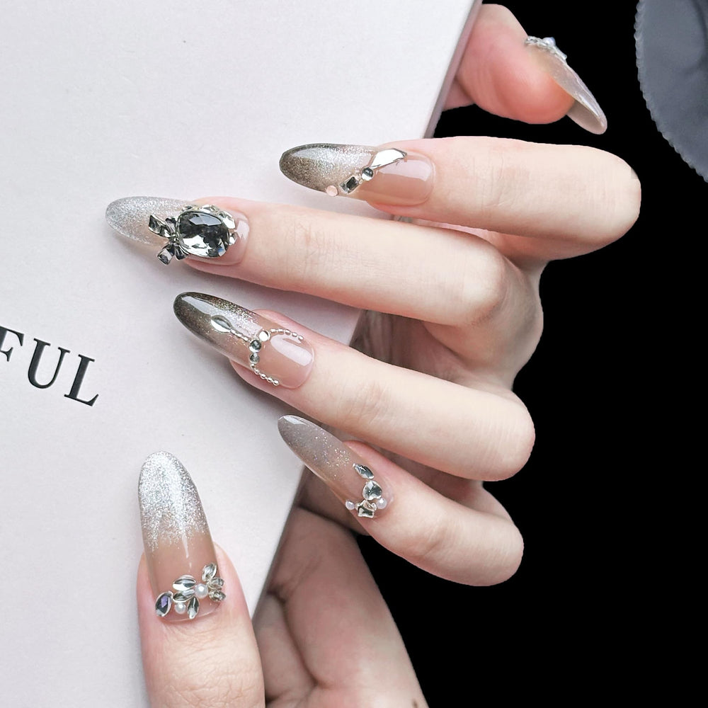 PHYLIN LEAF long almond nails pink and black design with gold accents for special occasions