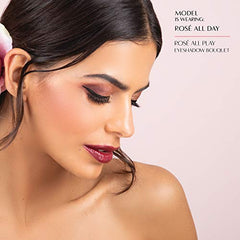 Physicians Formula Eyeshadow Bouquet pan-to-skin swatches demonstrate blendable texture.