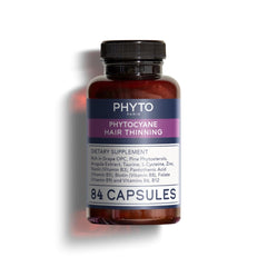 PHYTOCYANE bottle front with daily vegan capsules for thinning hair support.