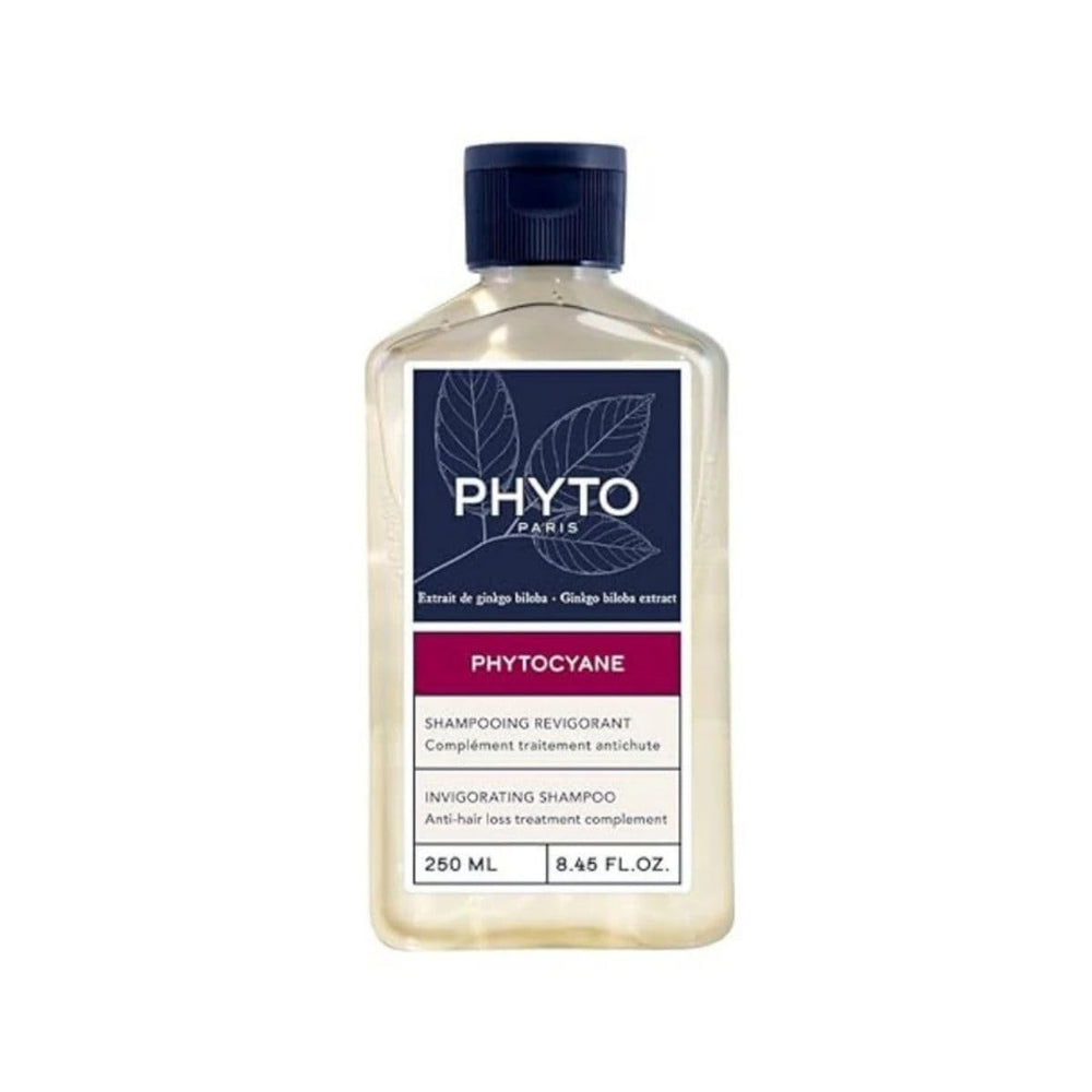 PHYTOPHYTOCYANE bottle pour demonstrates easy daily application for scalp care.