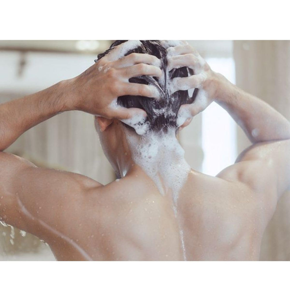 PHYTO Phytocyane Men shampoo foam being lathered for cleansing