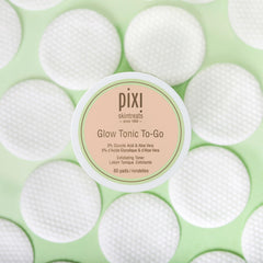 Pixi Glow Tonic to-Go pads saturated with glycolic formula gently polish skin.