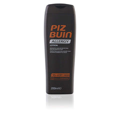 Applying Piz Buin Allergy Lotion to the skin for smooth, even coverage.