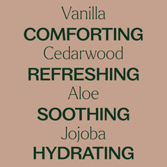 Close-up of Vanilla Woods ingredients including aloe, vitamin E, and jojoba.